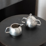 Coffee & Tea Set by Frederick Lunning