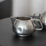 Coffee & Tea Set by Frederick Lunning