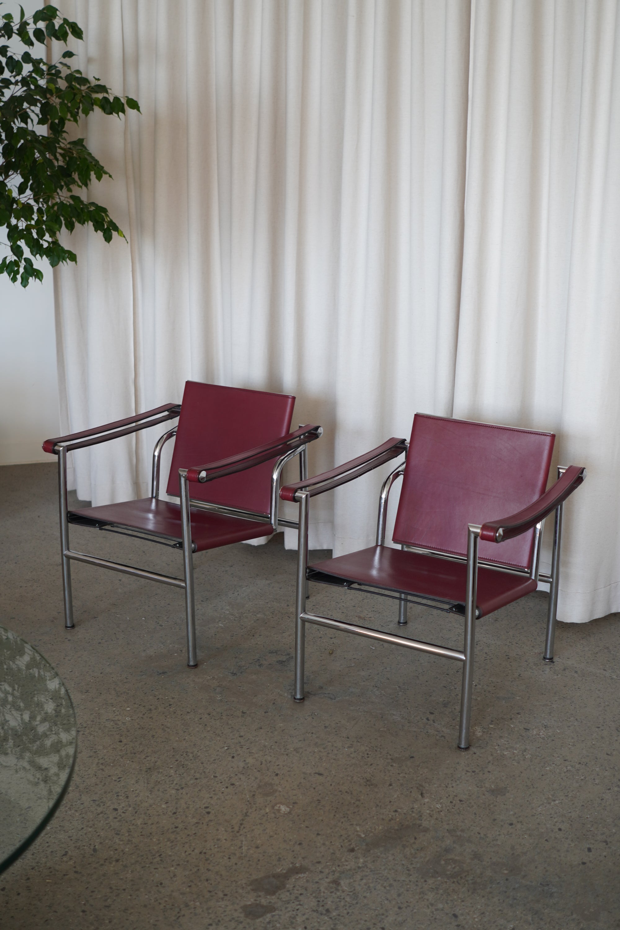 Leather Swivel Back Sling Armchairs
