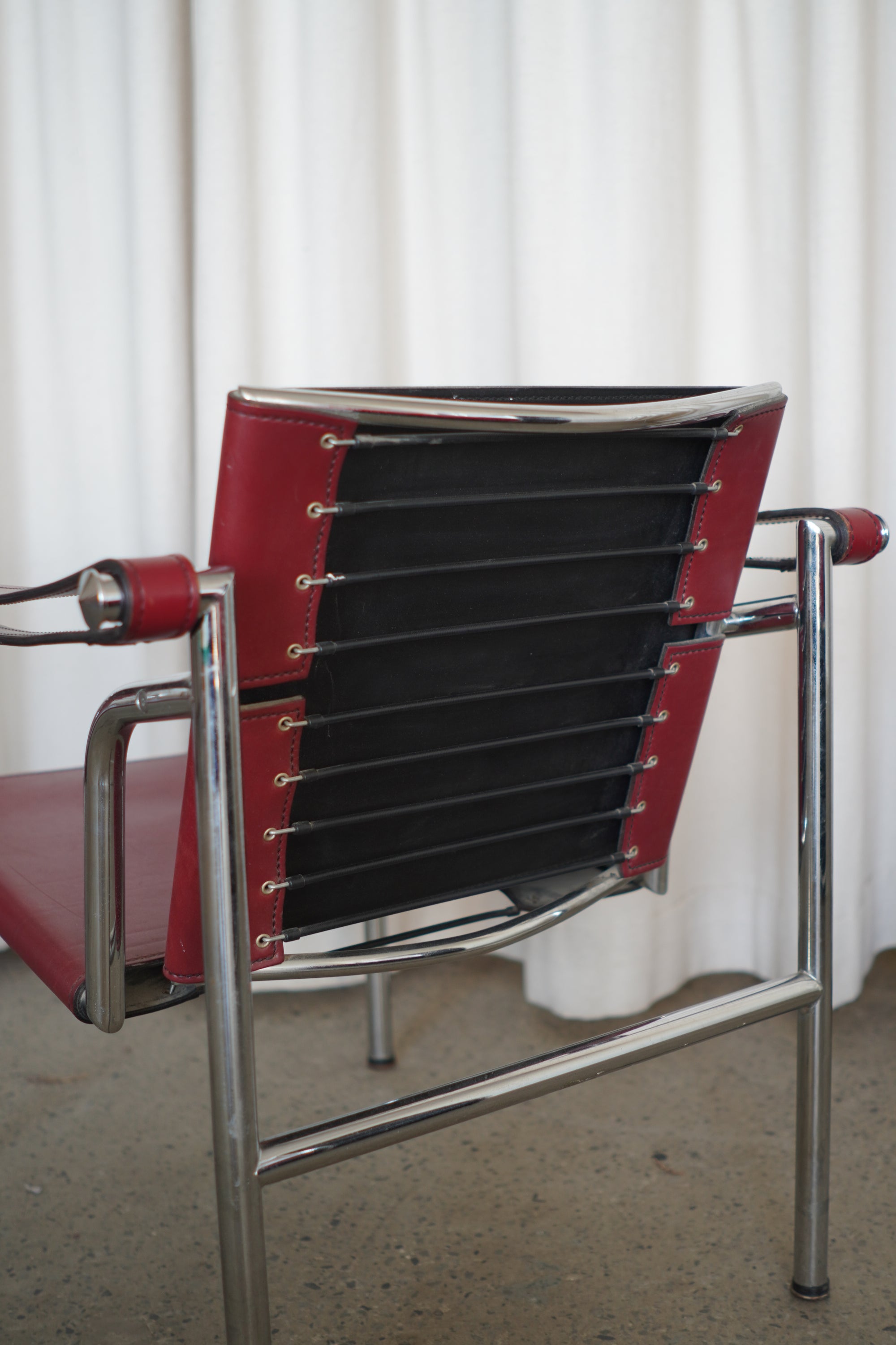 Leather Swivel Back Sling Armchairs
