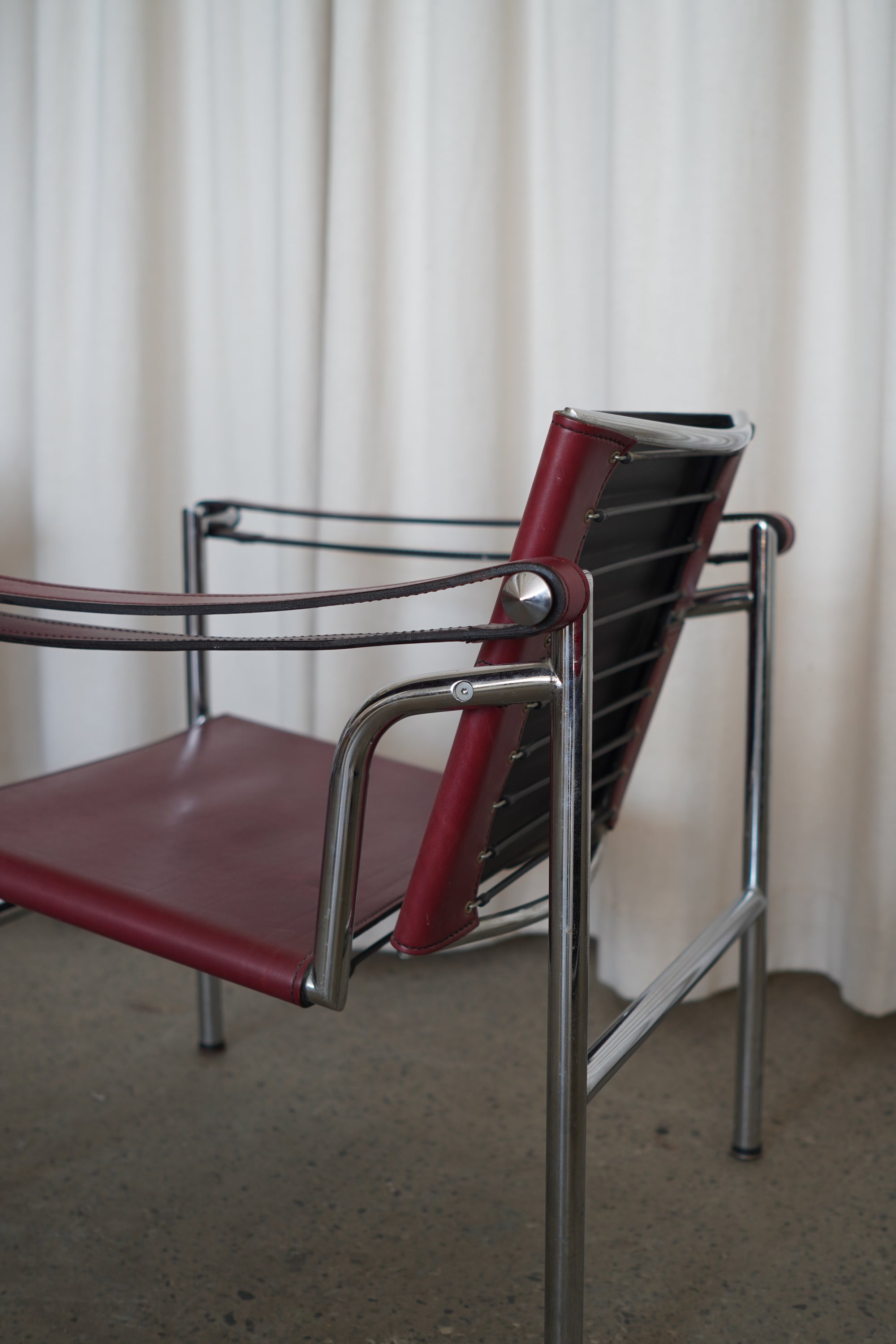 Leather Swivel Back Sling Armchairs