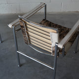 Cowhide Swivel Back Sling Armchairs