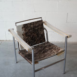 Cowhide Swivel Back Sling Armchairs