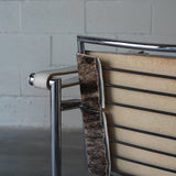 Cowhide Swivel Back Sling Armchairs