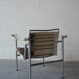 Cowhide Swivel Back Sling Armchairs