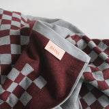 Roman Pool towel in Cement & Rhus by Baina