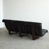 Canapé sling en cuir et palissandre