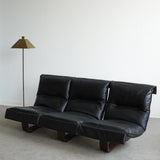 Canapé sling en cuir et palissandre