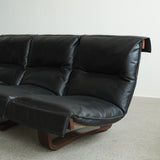 Canapé sling en cuir et palissandre