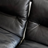 Canapé sling en cuir et palissandre