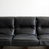 Canapé sling en cuir et palissandre