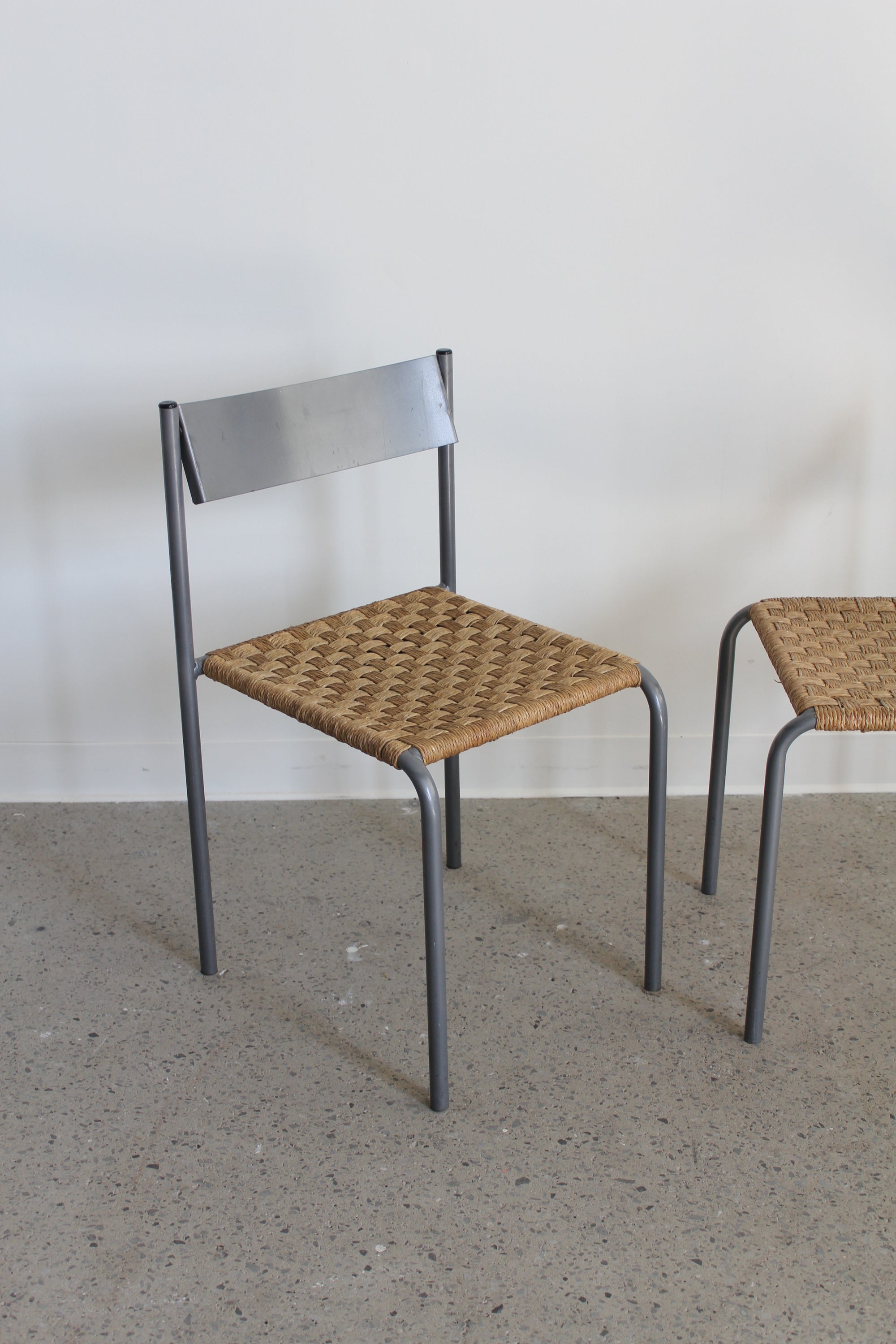 Rush and Metal Stacking Chairs