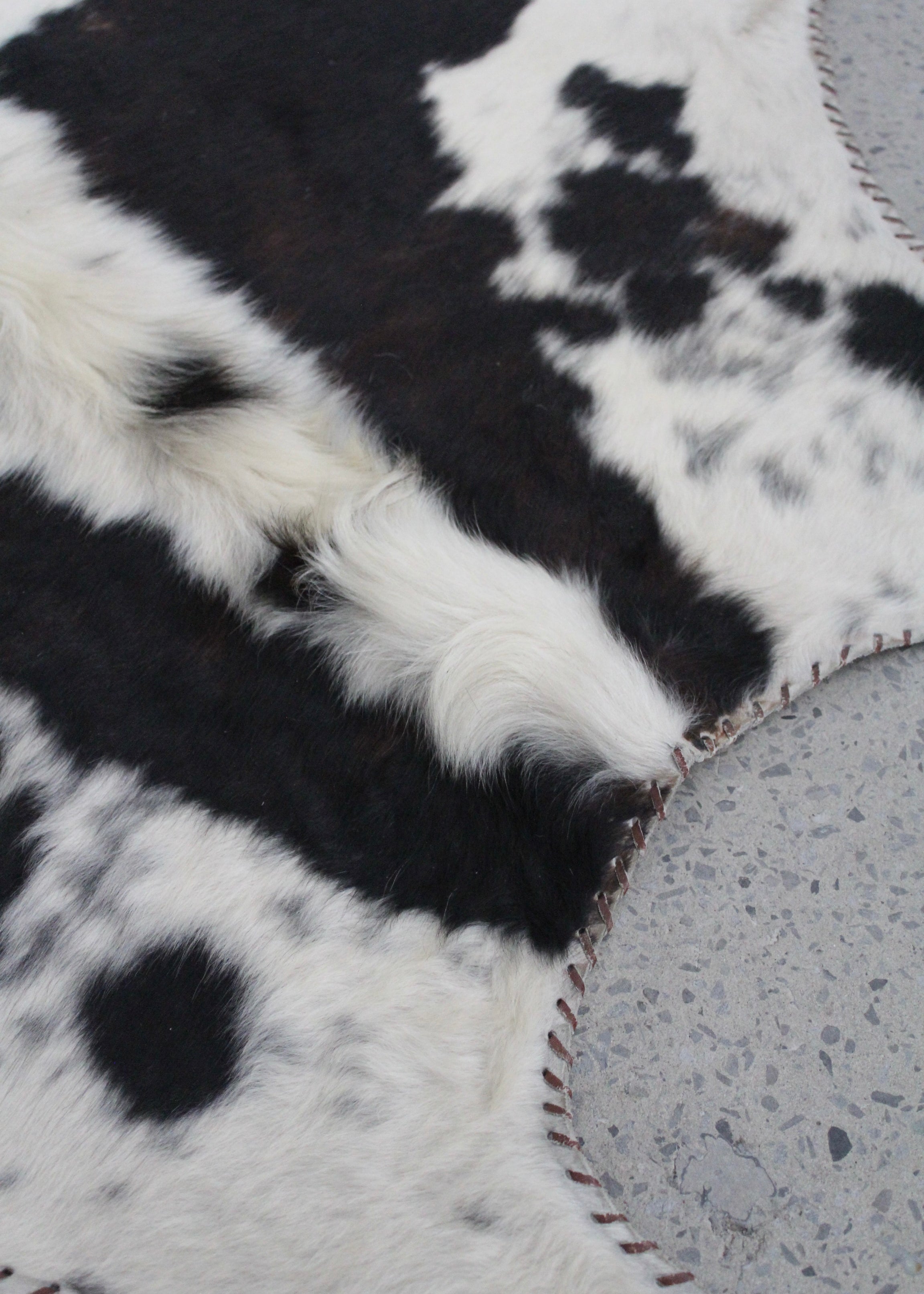 Vintage Speckled Cowhide Rug Tricolour Leather Trim