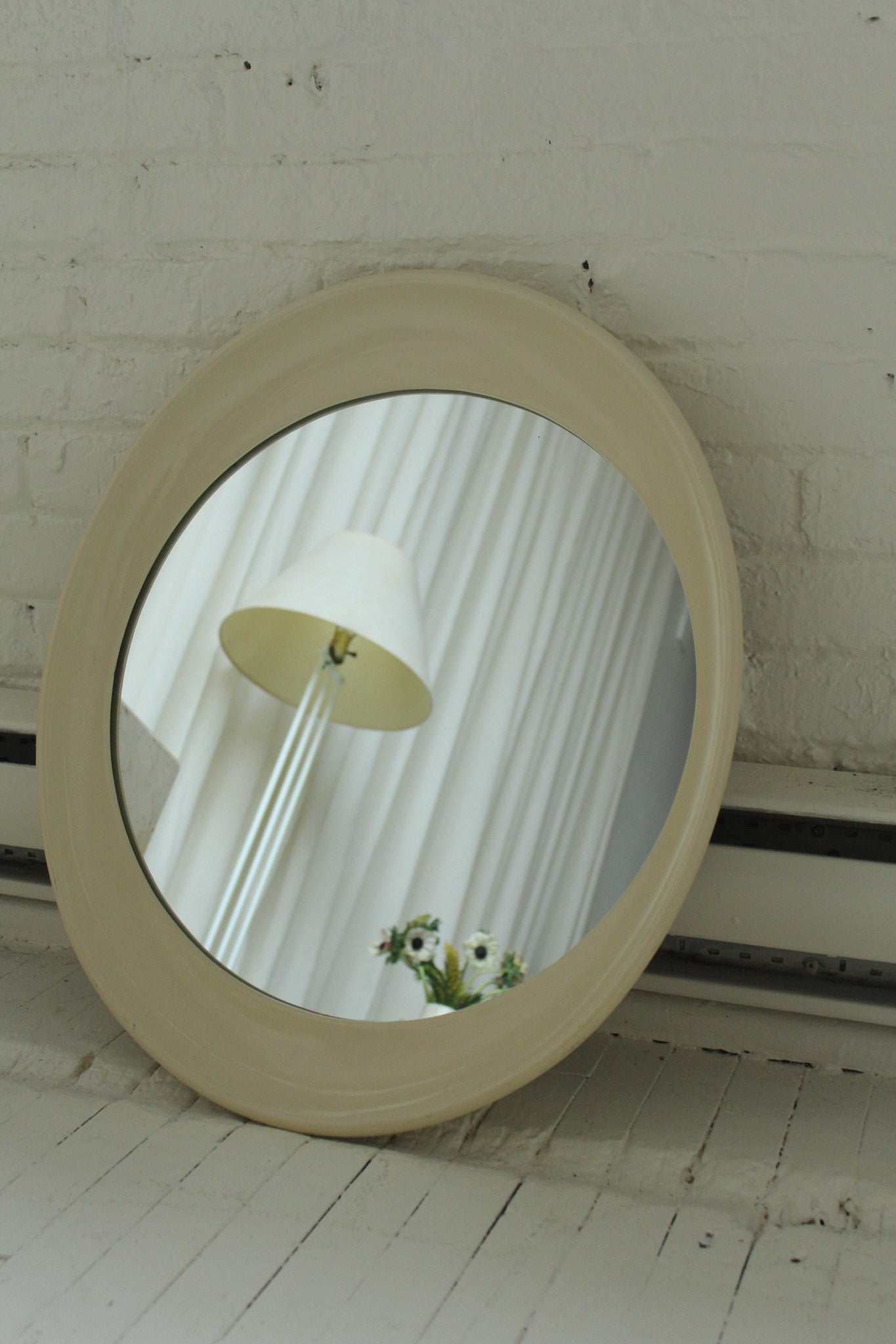 Oval plastic mirror