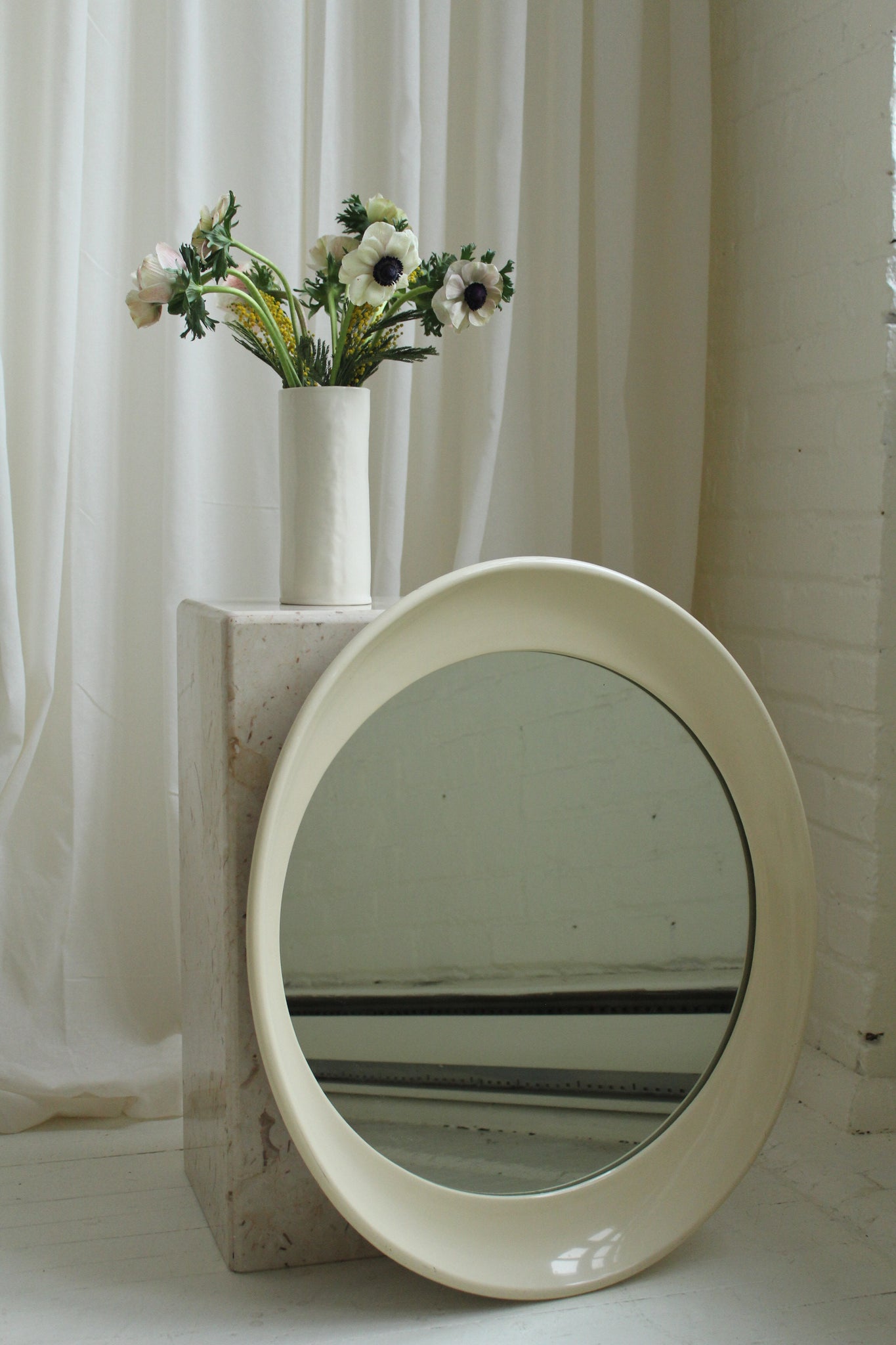 Oval plastic mirror