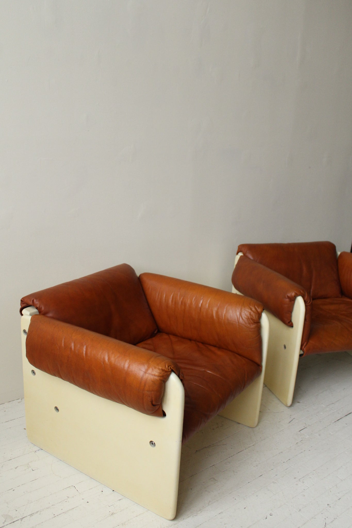 Muller & Stewart Lounge Chairs