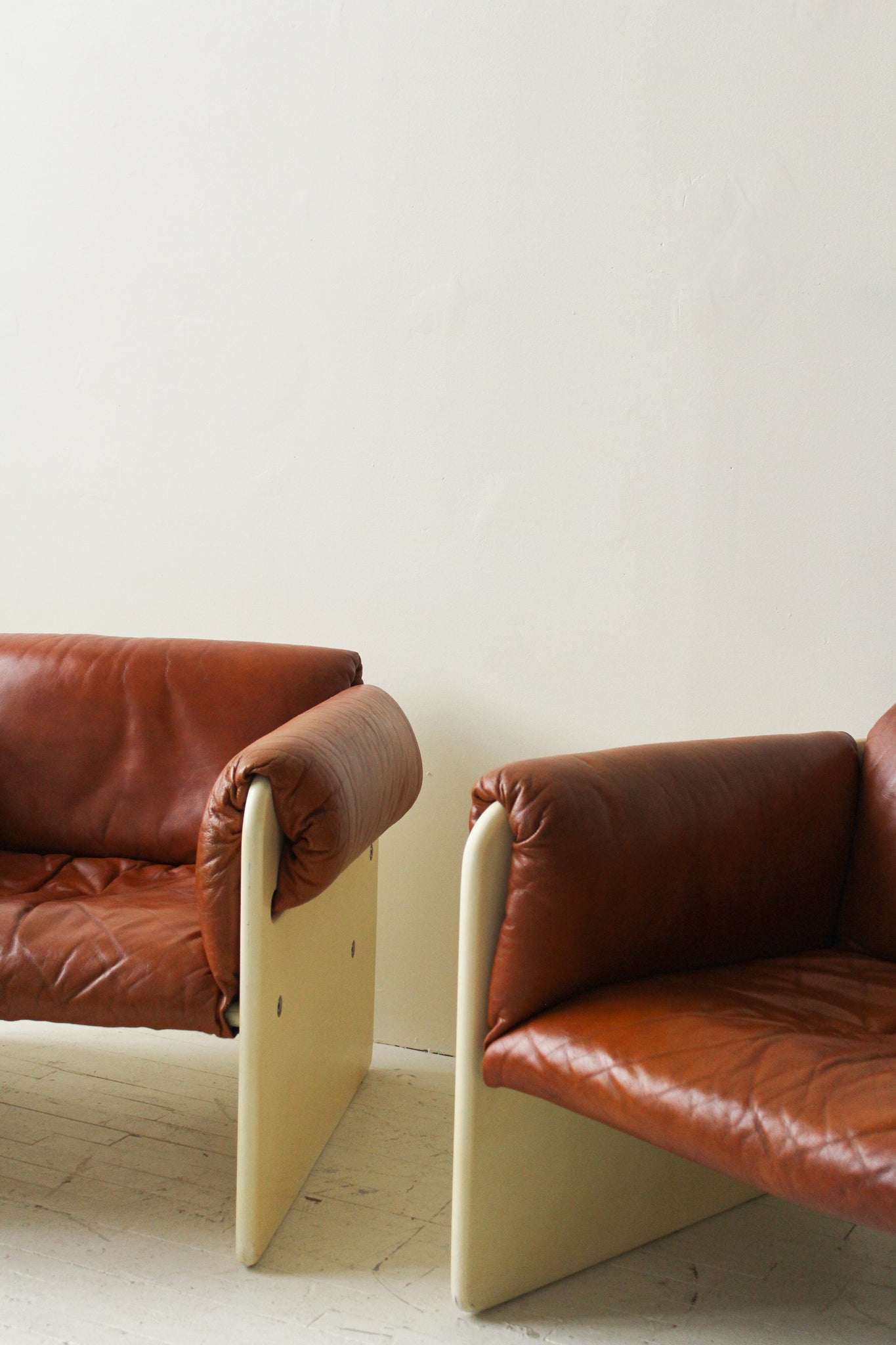 Muller & Stewart Lounge Chairs