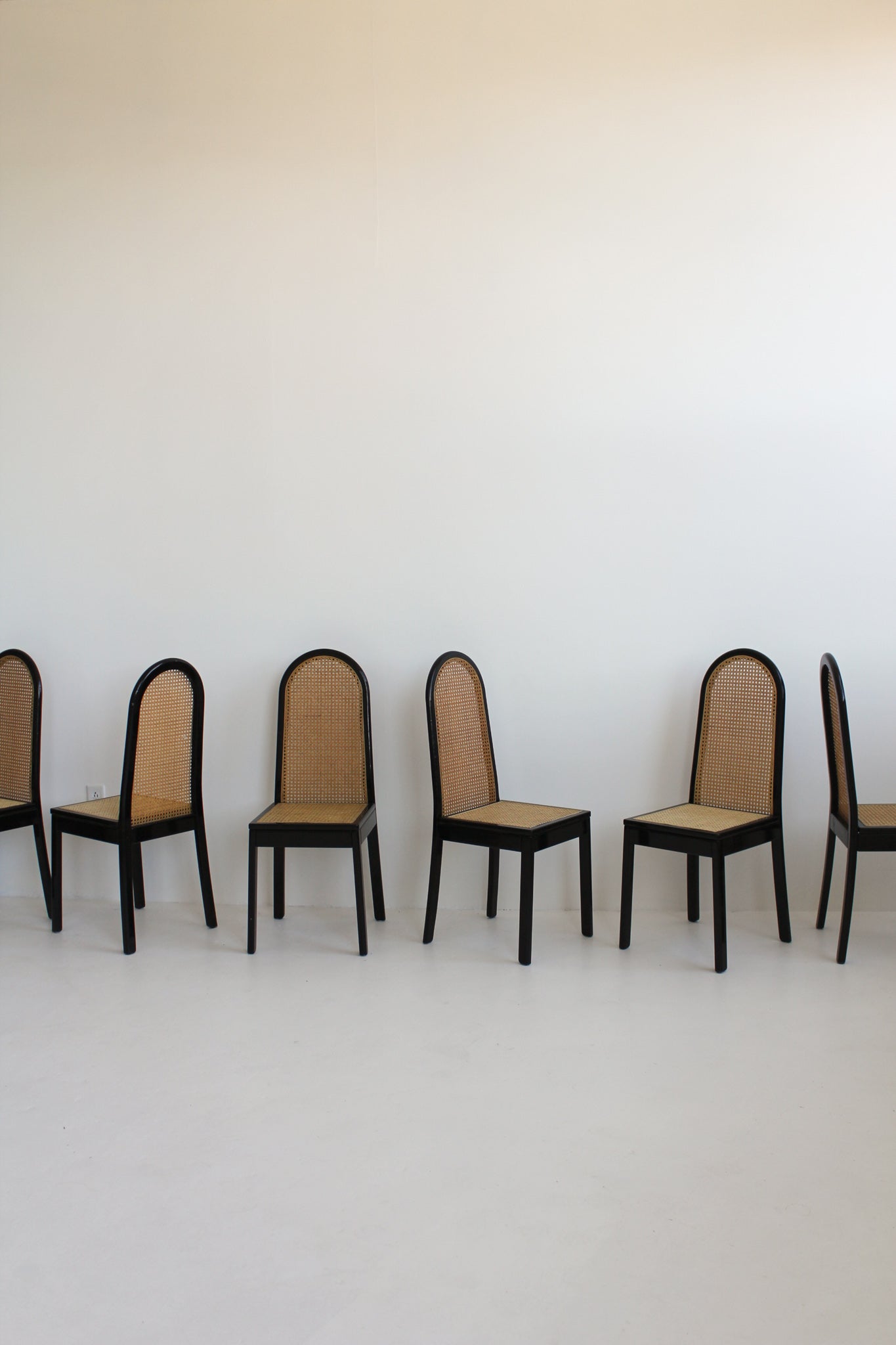 Black Lacquered Cane Dining Chairs