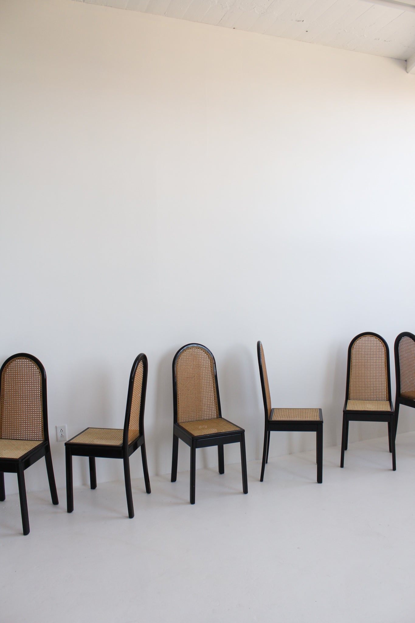 Black Lacquered Cane Dining Chairs