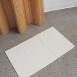Tapis de bain Eyre ivoire par Baina