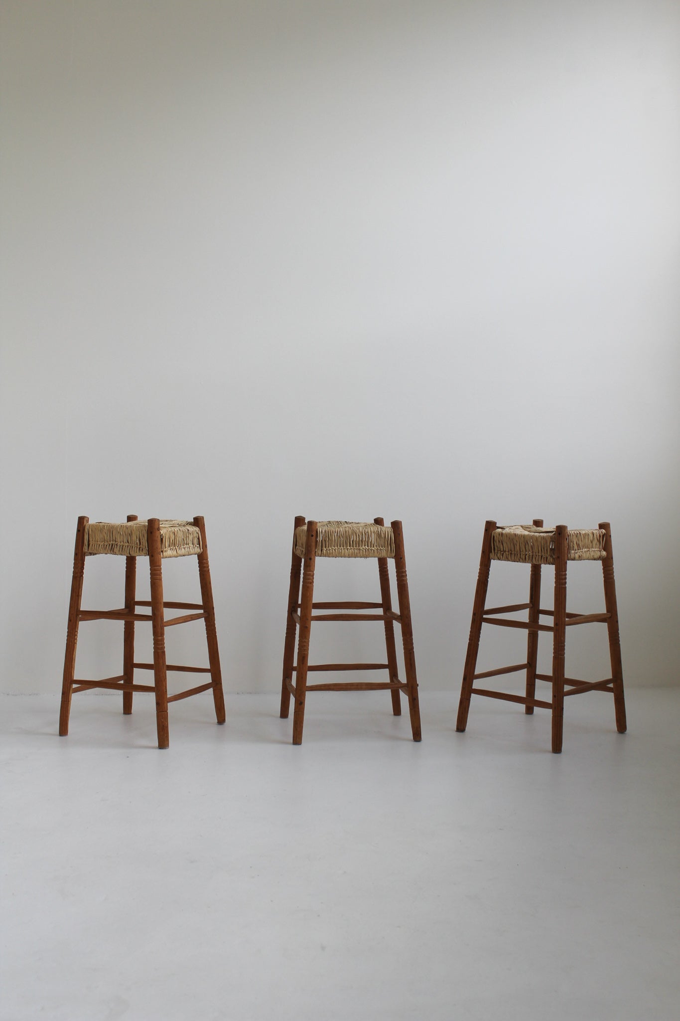 Straw and Wood Counter Stools