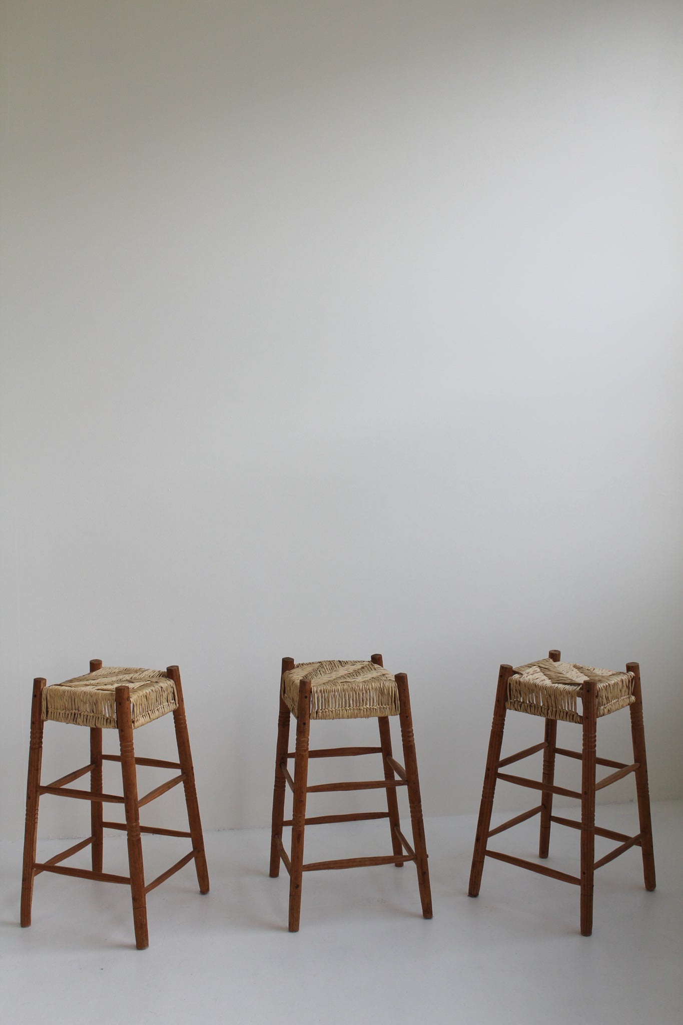 Straw and Wood Counter Stools