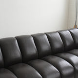 Canapé sectionnel capitonné en cuir