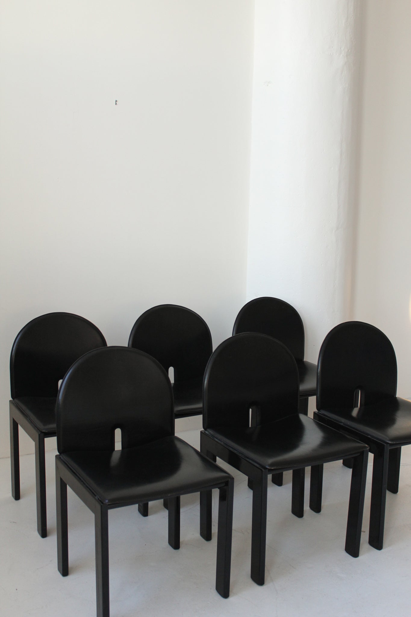 Black Leather and Wood Chairs