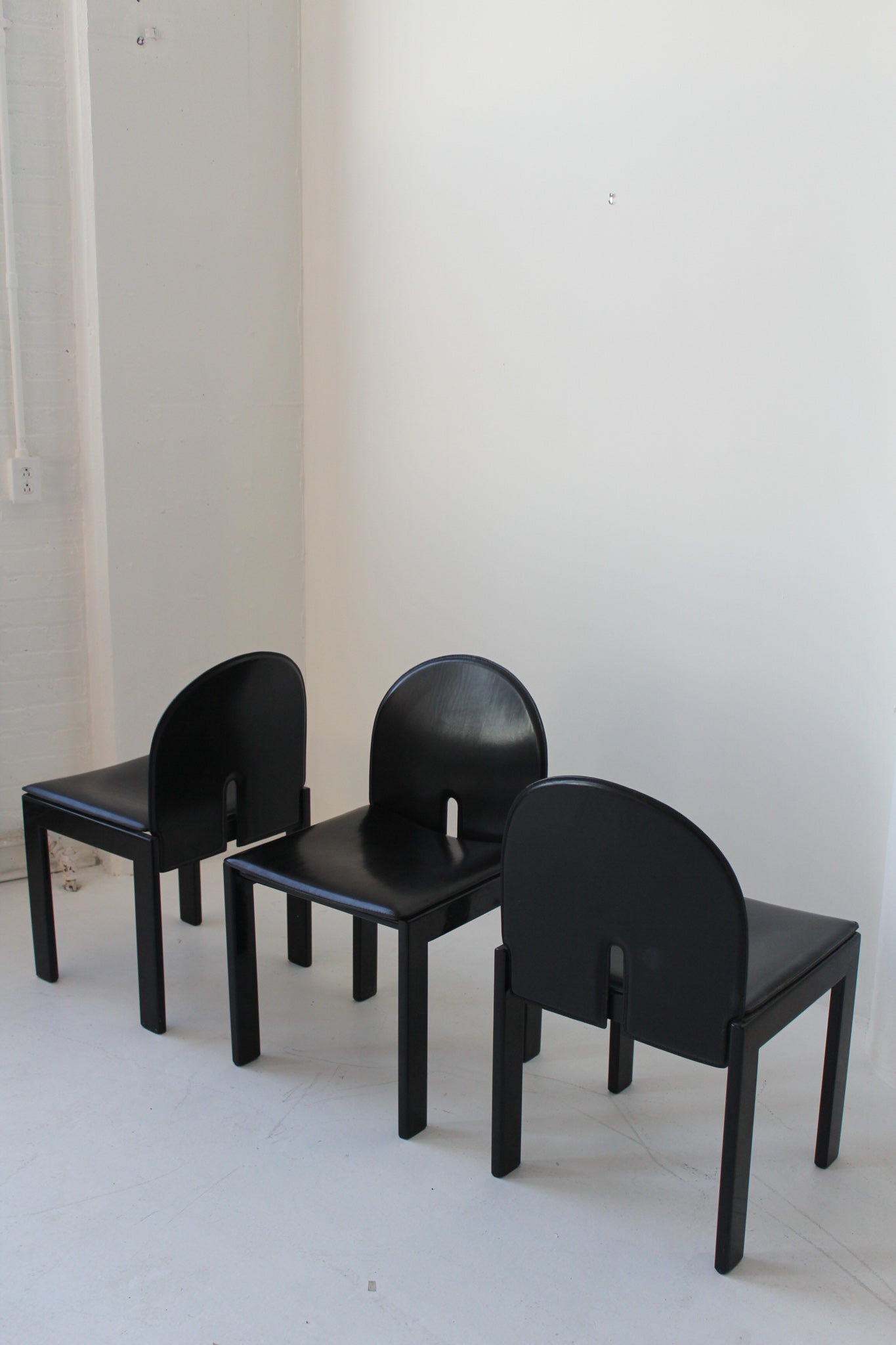 Black Leather and Wood Chairs