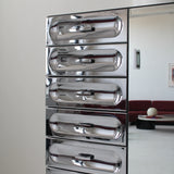 Garde-robe en chrome par Henri Vallières