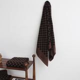 Roman Pool towel in Tabac & Noir by Baina